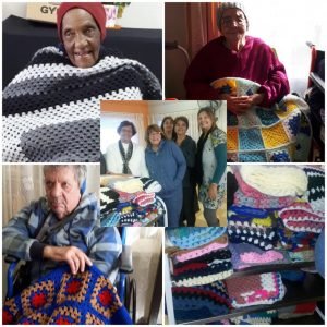 Starlights Creative Club - Seniors receiving blankets